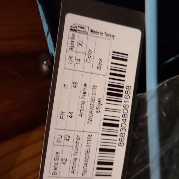 Dress..new with tags..not sure of actual size but included the picture of the ta - Picture 2 of 3